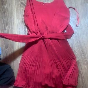 Size small. Worn once. Ties around waist. ROMPER